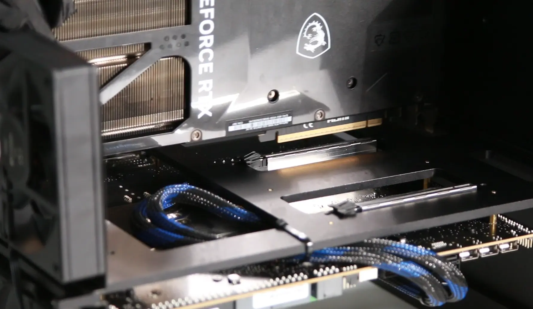 Securing GPUs vertically to the female end of the PCIe riser