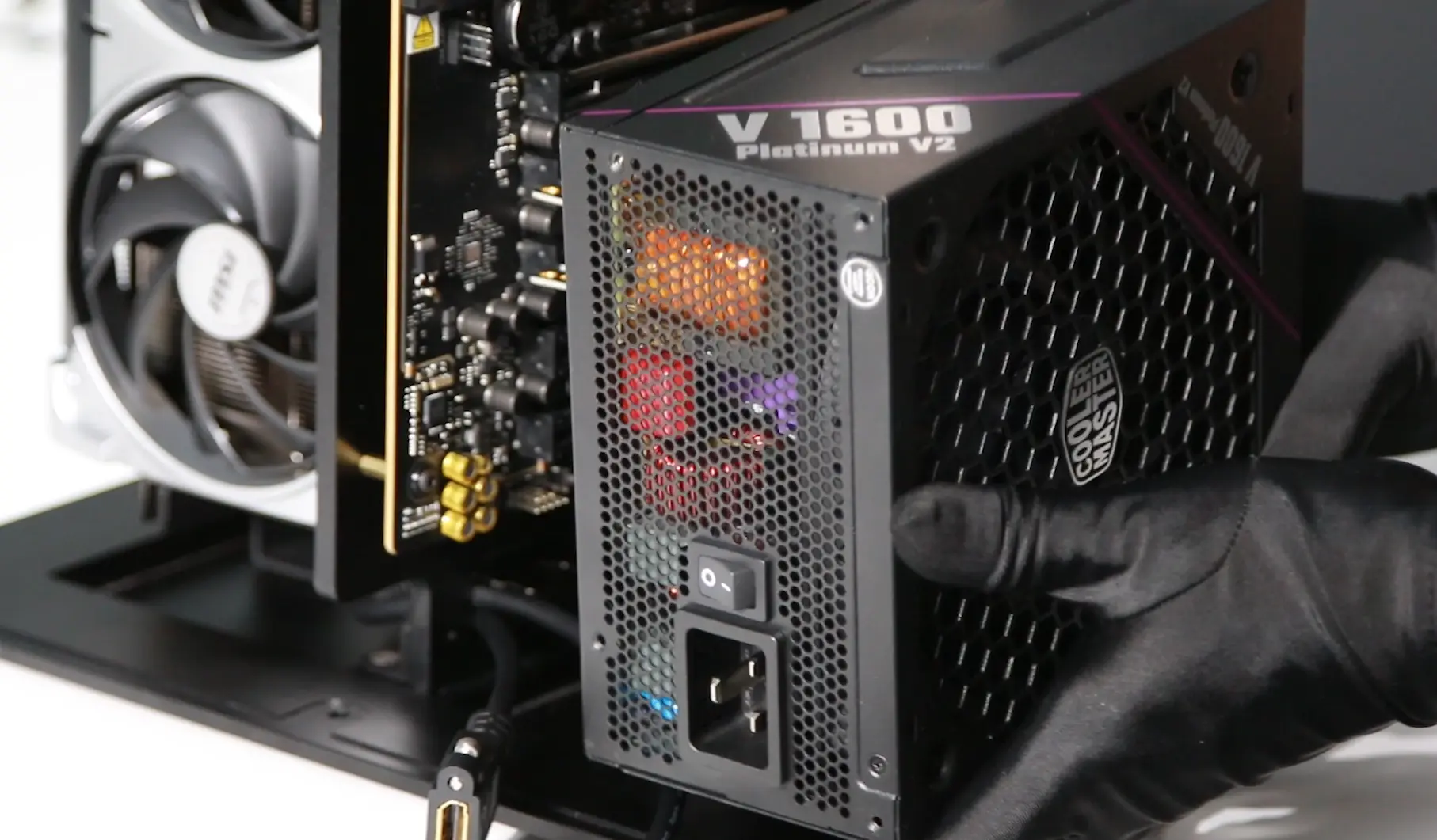 Attaching the PSU to the frame base and connecting power cables