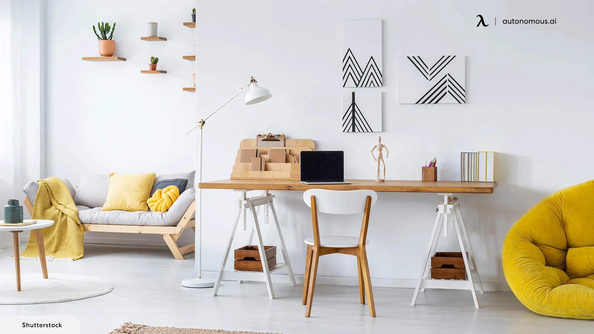 What are the benefits of having a home office desk against a wall?