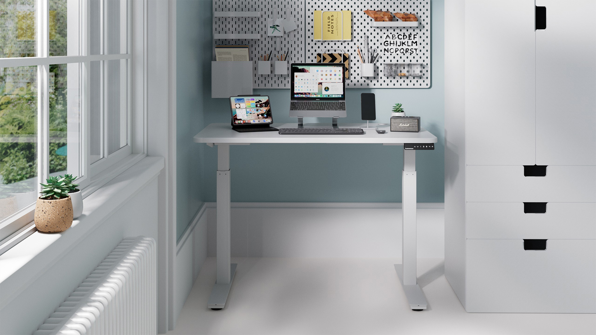 An efficient workspace for those with limited space or who frequently move their Mac and PC desk setup