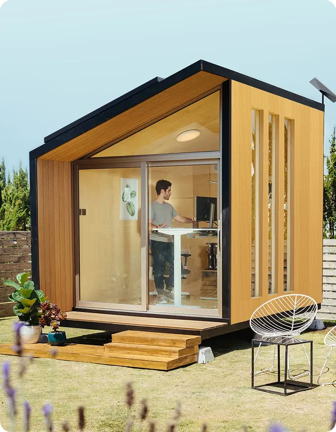 WorkPod backyard office with a standing desk inside