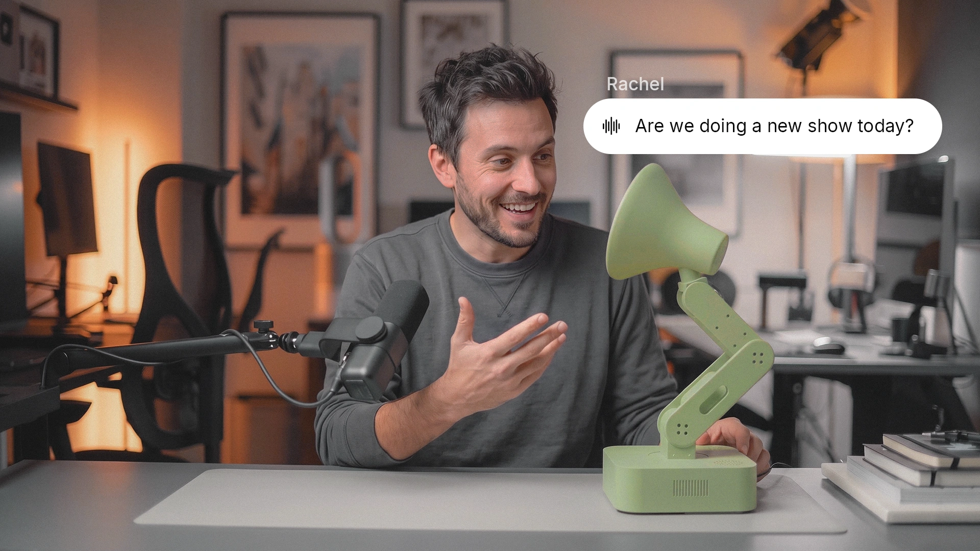 Concept of a creator laughing with Lamp beside the microphone during a show