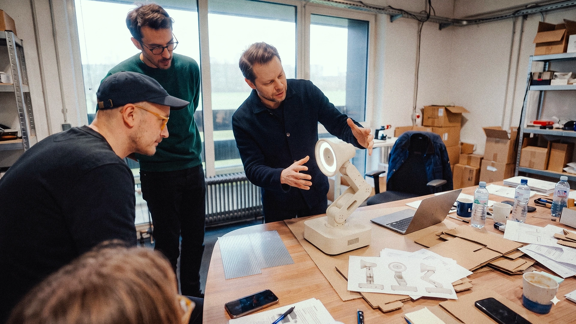 Concept of a team testing Lamp’s movements on a workshop table