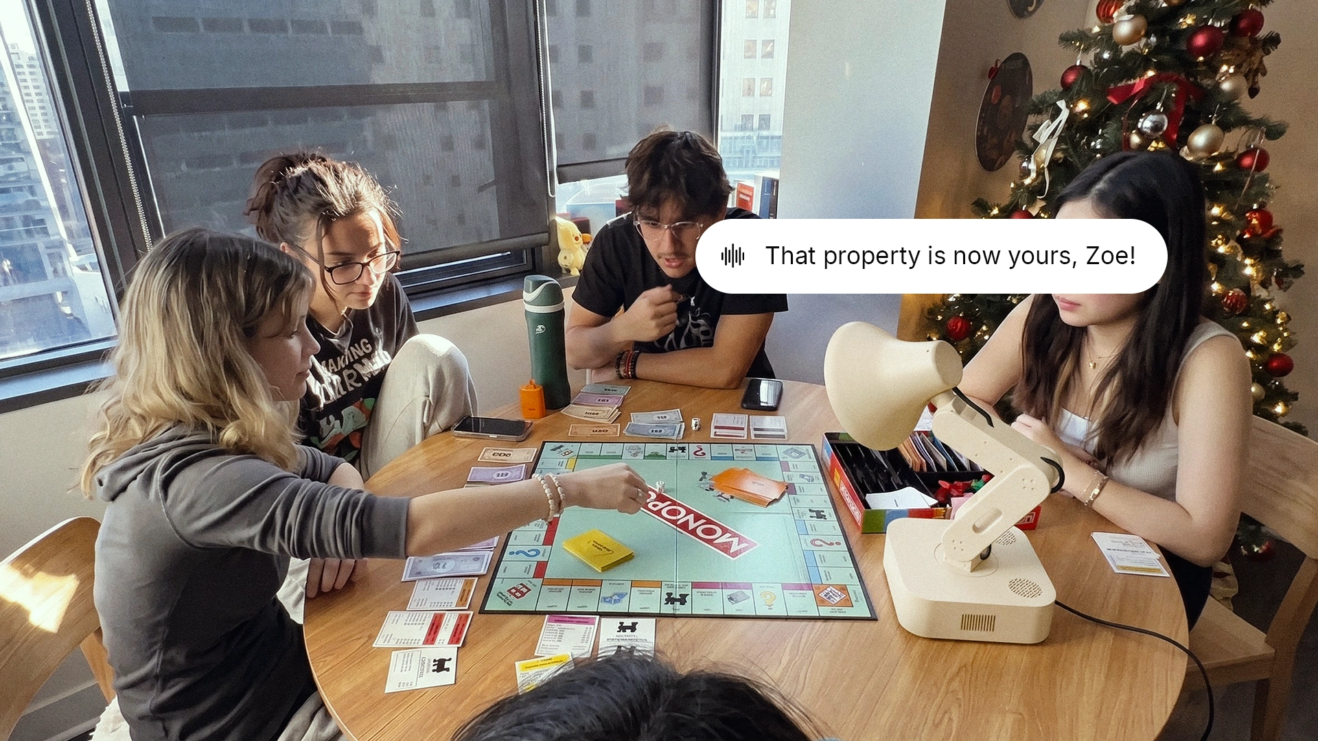 Concept of three friends laughing as Lamp congratulates the winner of a board game