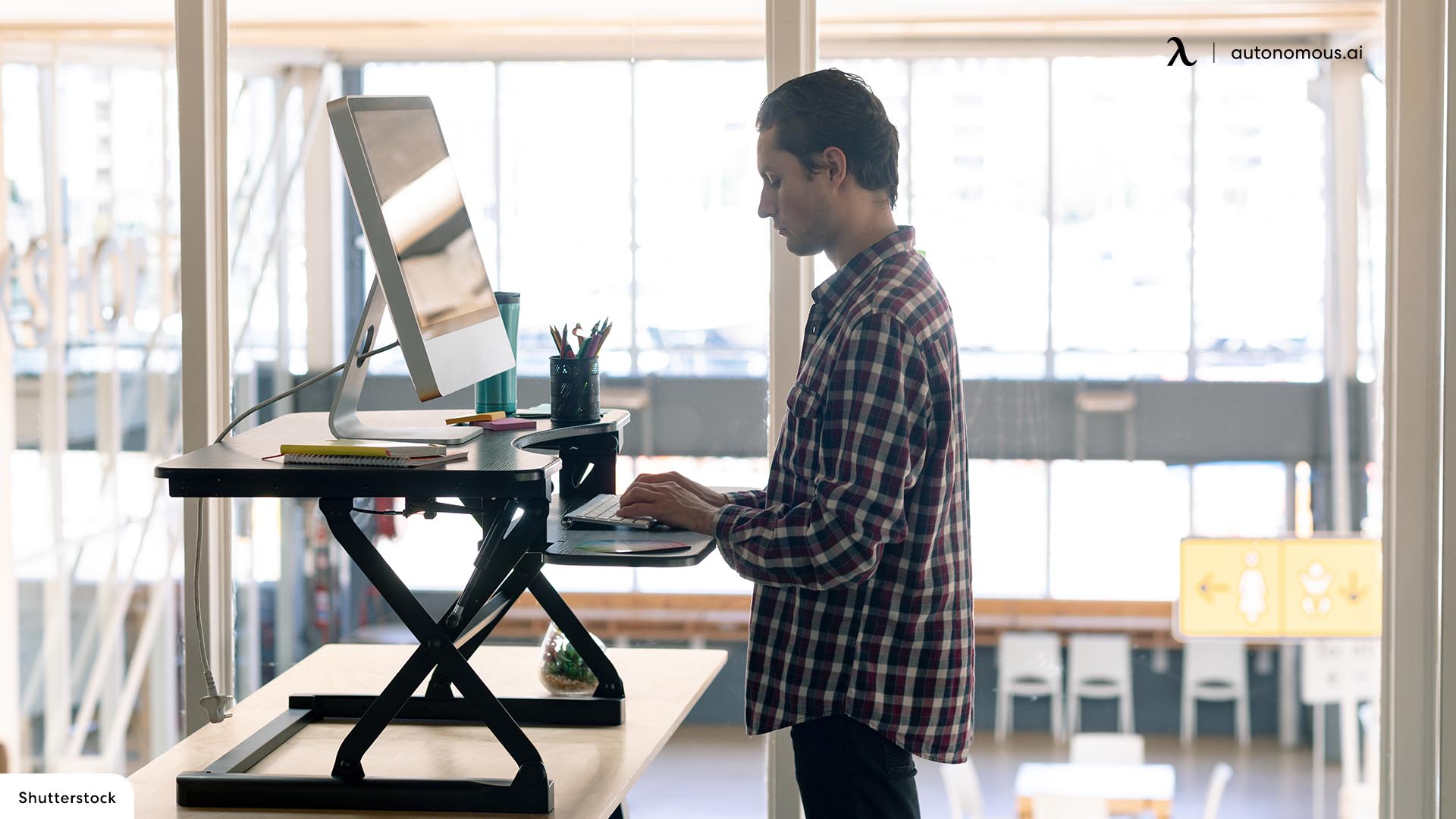 What Are the Benefits of Adjustable Sit Stand Desk Risers?