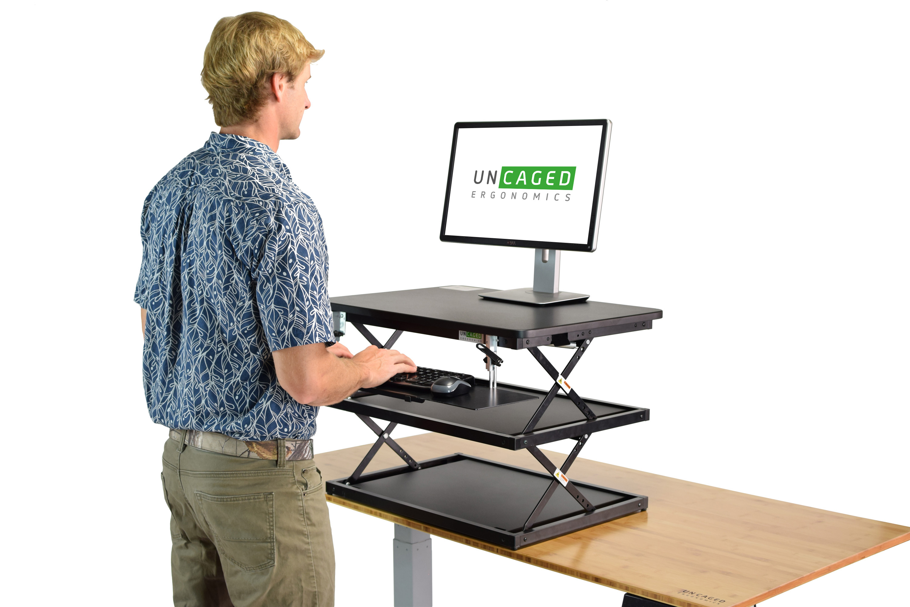 Uncaged Ergonomics Change Desk Standing Desk Riser in the Office