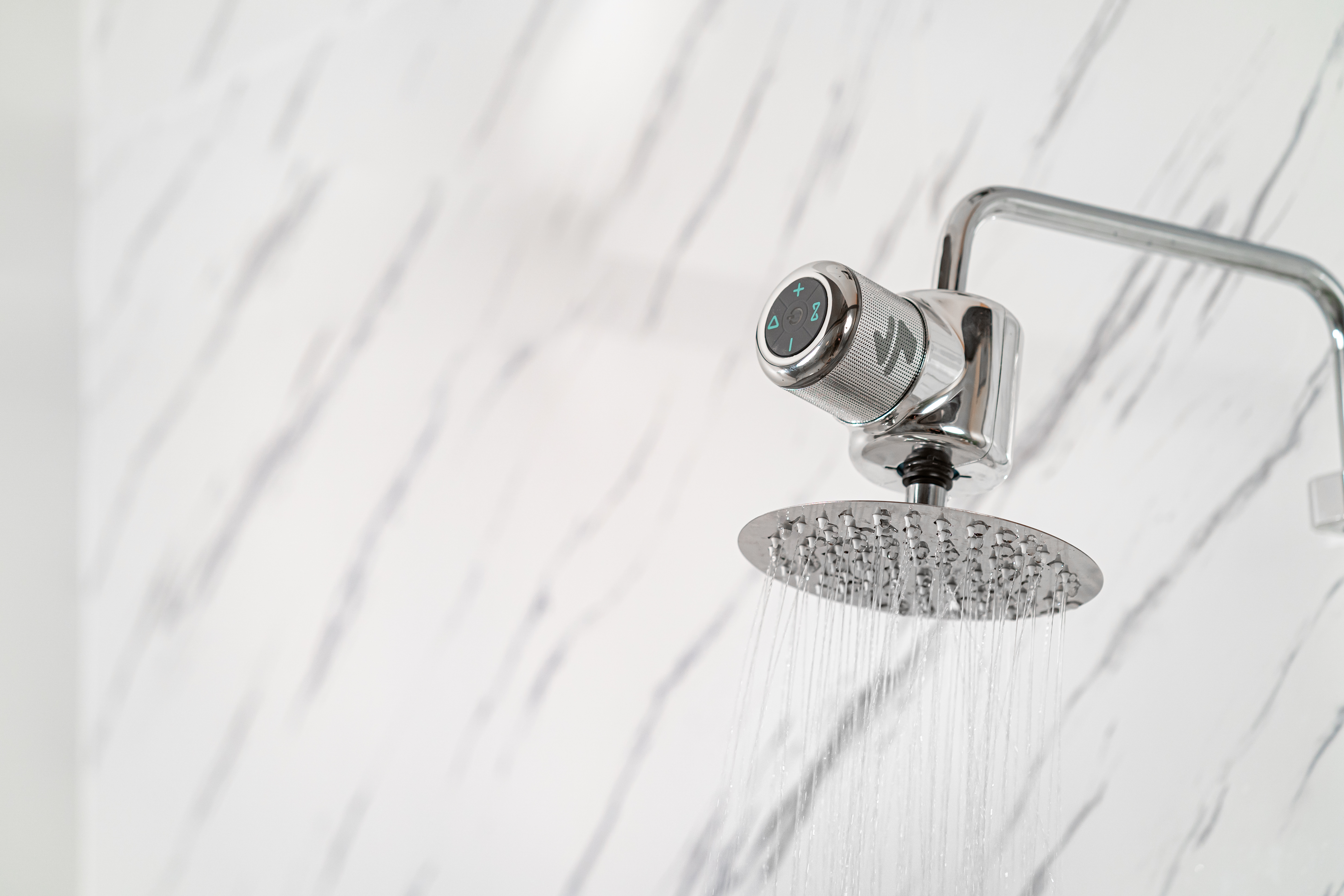 Shower Power is a water-powered shower head speaker for bathroom