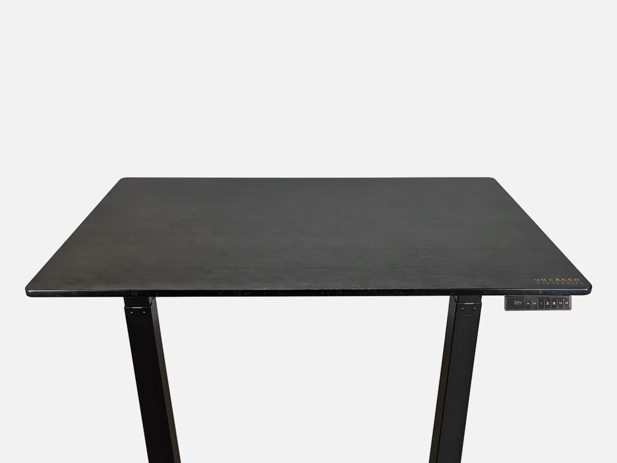 Uncaged Ergonomics Rise Up Electric Standing Desk